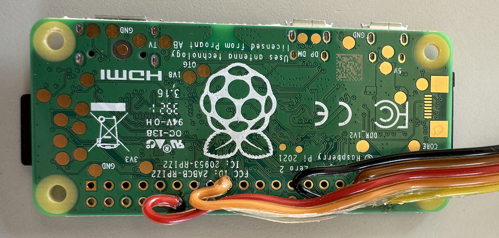Back of the board with microphone cable directly soldered to it