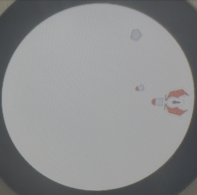The spaceship avoiding a meteorite and firing some missiles